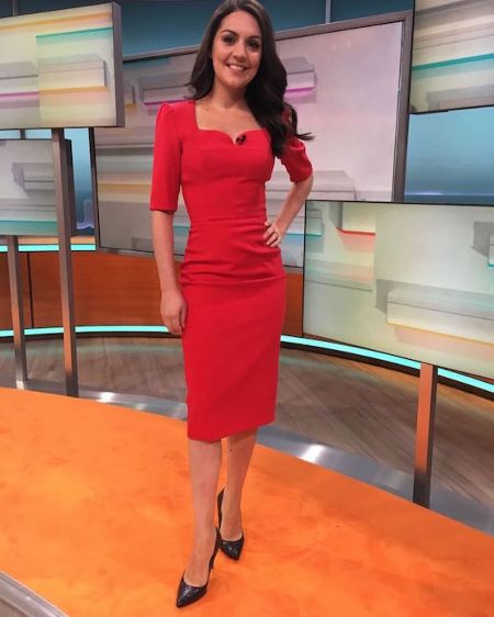 Laura Tobin in a red dress caught on the camera.